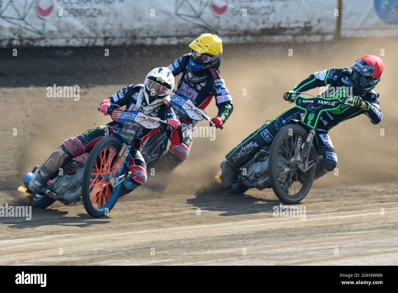 Rybnik, Poland. 04th Sep, 2021. Jakub KRAWCZYK of Ostrovia (white) leads, Sebastian SZOSTAK of Ostrovia (yellow) and Wiktor TROFIMOW JR of ROW (red) in Heat 4 during eWinner Division One Speedway League Play-off match between K.S. ROW Rybnik and ARGED Malesa TZ OSTROVIA at Municipal Stadium in Rybnik, Poland on September 4, 2021 (Photo by Andrew SURMA/ Credit: Sipa USA/Alamy Live News Stock Photo