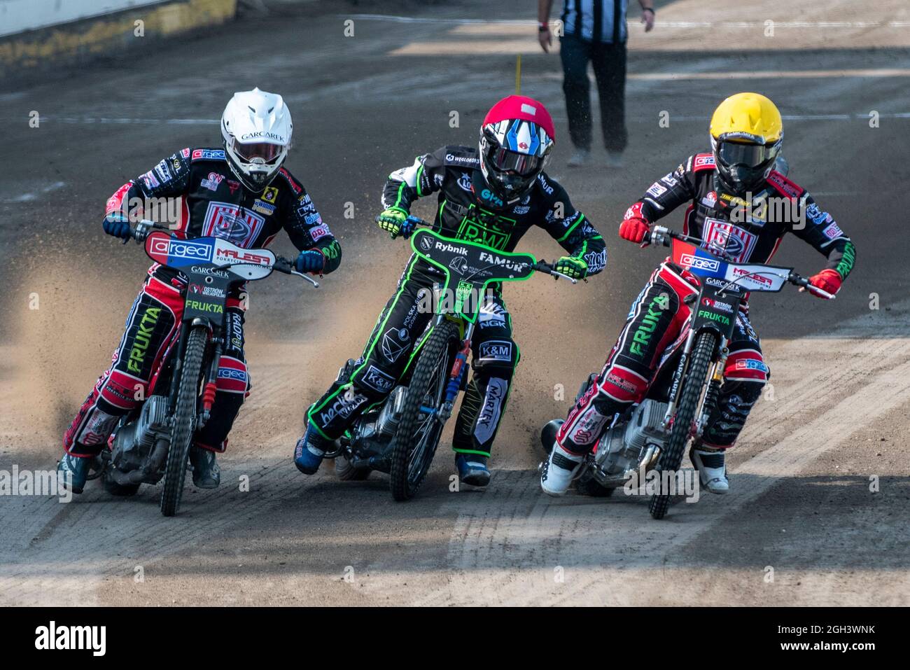 Rybnik, Poland. 04th Sep, 2021. Grzegorz WALASEK of Ostrovia (white), Pontus ASPGREN of ROW (red) and Nicolai KLINDT of Ostrovia (yellow) in Heat 1 during eWinner Division One Speedway League Play-off match between K.S. ROW Rybnik and ARGED Malesa TZ OSTROVIA at Municipal Stadium in Rybnik, Poland on September 4, 2021 (Photo by Andrew SURMA/ Credit: Sipa USA/Alamy Live News Stock Photo