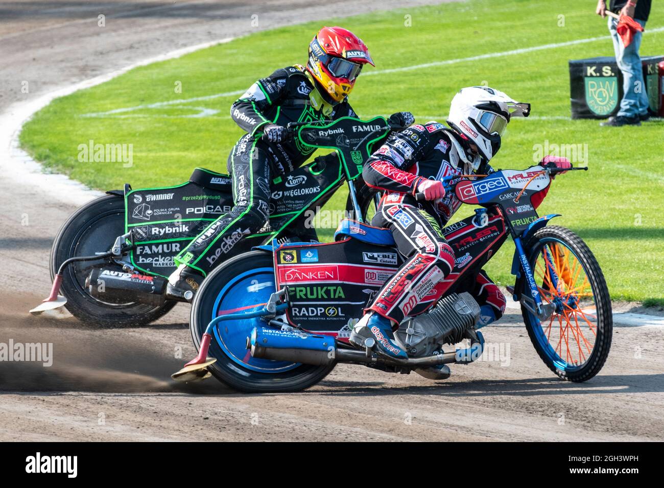 Rybnik, Poland. 04th Sep, 2021. Sebastian SZOSTAK of Ostrovia (white) and Mateusz TUDZIEZ of ROW (red) in Heat 2 during eWinner Division One Speedway League Play-off match between K.S. ROW Rybnik and ARGED Malesa TZ OSTROVIA at Municipal Stadium in Rybnik, Poland on September 4, 2021 (Photo by Andrew SURMA/ Credit: Sipa USA/Alamy Live News Stock Photo