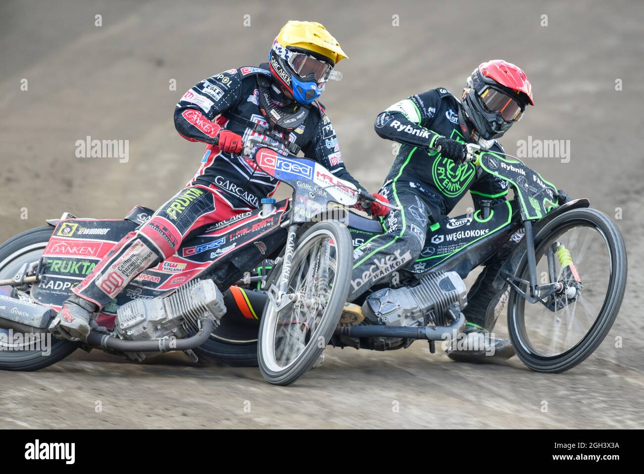 Rybnik, Poland. 04th Sep, 2021. Tomasz GAPINSKI of Ostrovia (yellow) and Michael JEPSEN JENSEN of ROW (red) in Heat 15 during eWinner Division One Speedway League Play-off match between K.S. ROW Rybnik and ARGED Malesa TZ OSTROVIA at Municipal Stadium in Rybnik, Poland on September 4, 2021 (Photo by Andrew SURMA/ Credit: Sipa USA/Alamy Live News Stock Photo