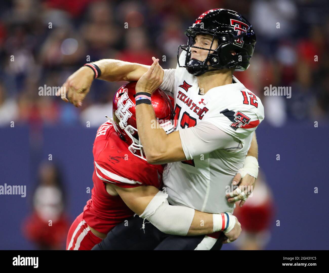 September 4, 2021: Houston Cougars defensive lineman Derek Parish (0) hits  Texas Tech Red Raiders quarterback Tyler Shough (12) during a pass attempt  during an NCAA football game between Houston and Texas