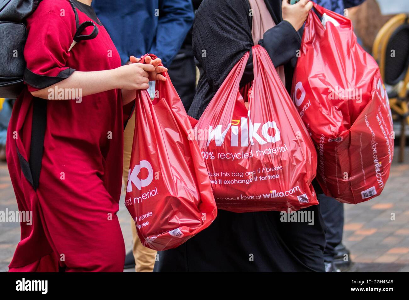 Carrying wilko red bag hires stock photography and images Alamy