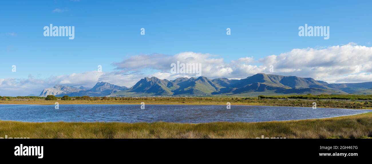 Lake at Rooisand Nature Reserve with the Kogelberg Mountains in the background. Kleinmond, Overberg, Whale Coast, Western Cape, South Africa. Stock Photo