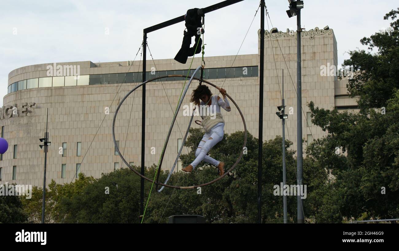 BARCELONA, SPAIN - Sep 24, 2010: A female circus performer outdoors in Barcelona, Spain during the local La Merce holiday Stock Photo