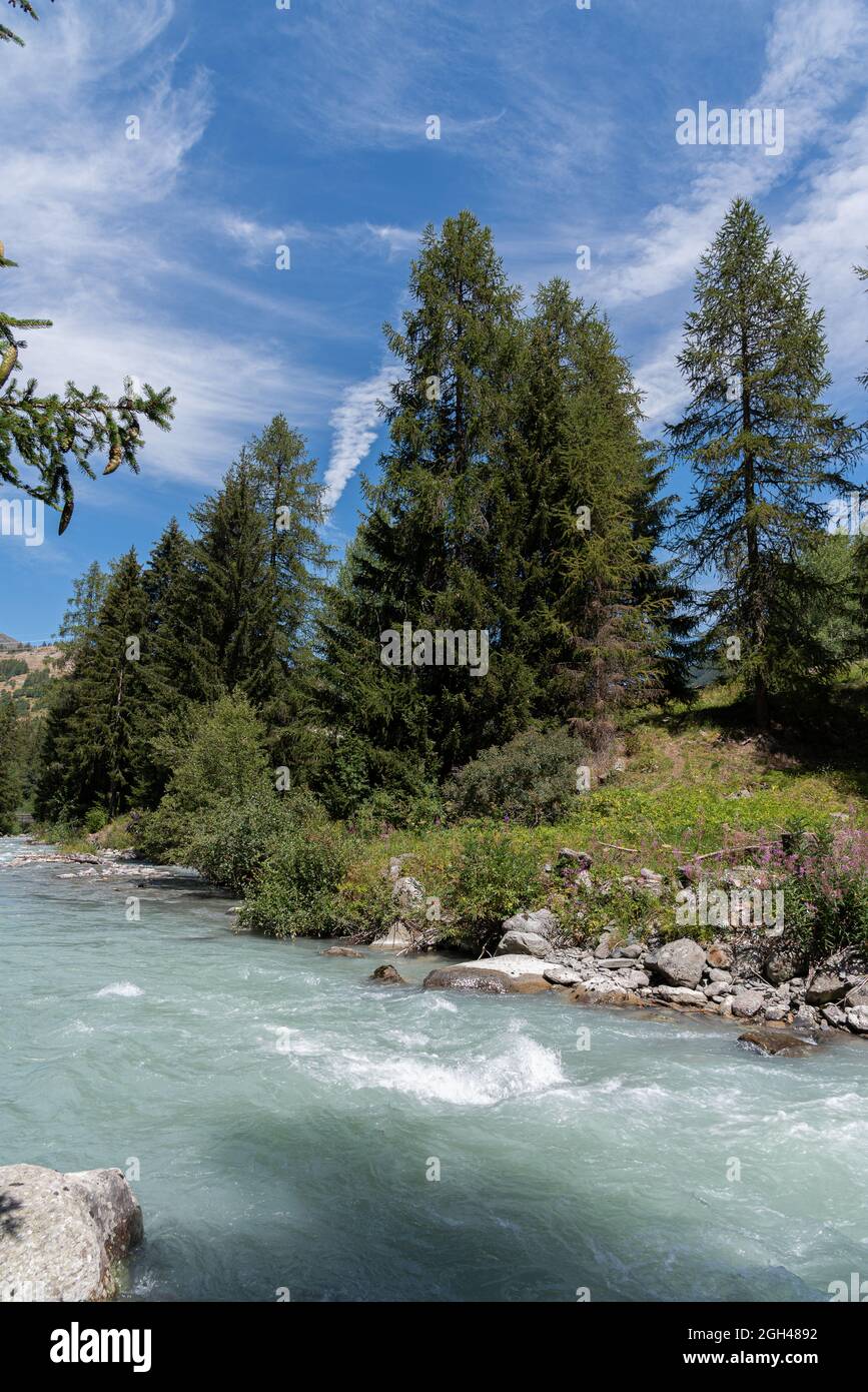 The Dora di Verney (Doire du Verney in French) is a stream that flows into the Vallone di La Thuile, in the Aosta Valley, a right tributary of the Dor Stock Photo