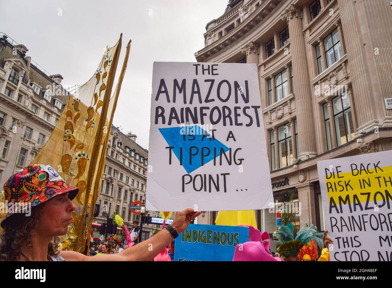 London, UK. 04th Sep, 2021. A protester holds a placard which says 'The Amazon Rainforest Is At A Tipping Point' during the demonstration in Oxford Street.Extinction Rebellion protesters staged the March For Nature on the final day of their two-week Impossible Rebellion campaign, calling on the UK Government to act meaningfully on the climate and ecological crisis. Credit: SOPA Images Limited/Alamy Live News Stock Photo