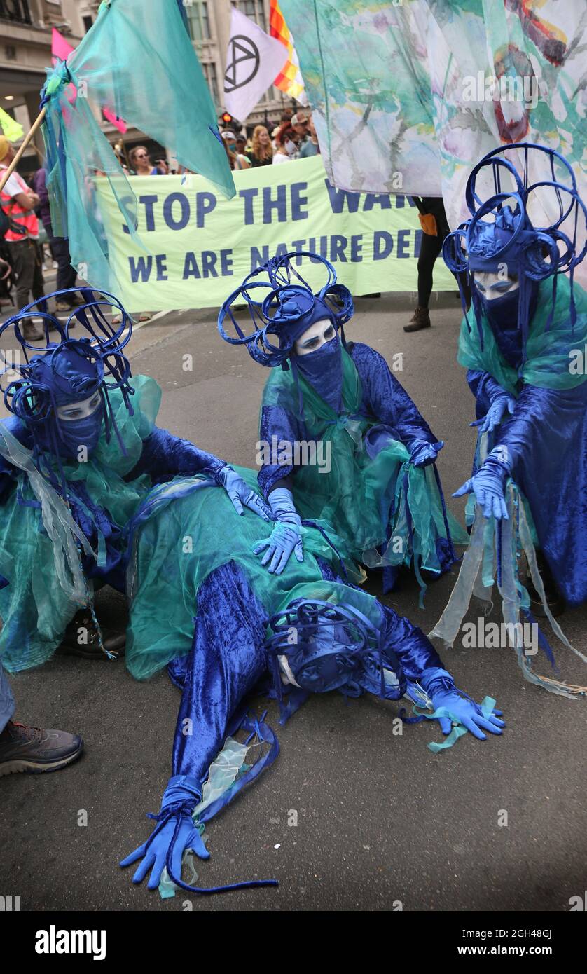 London, UK. 04th Sep, 2021. Members of the blue rebels take part during the demonstration.Rebels march for nature to end the Impossible Rebellion. They say our nature is in crisis. We have lost 70% of all plant and animal life on this planet in just 50 years. Our living planet is gasping from continued extraction and burning of coal, oil and gas. They demand that all fossil fuel investment must stop immediately. Credit: SOPA Images Limited/Alamy Live News Stock Photo