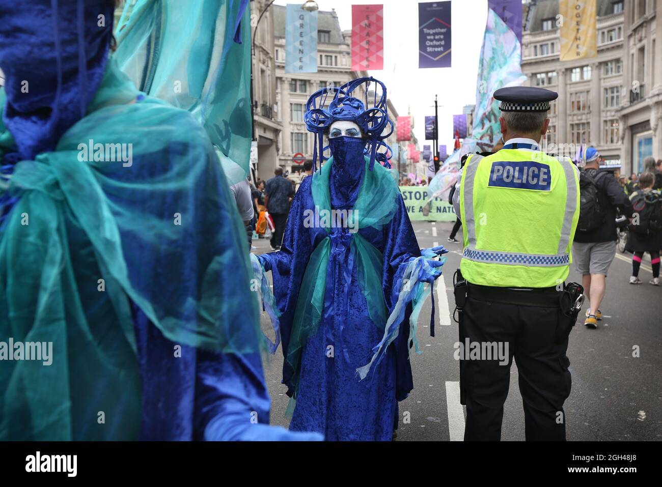 London, UK. 04th Sep, 2021. Members of the blue rebels take part during the demonstration.Rebels march for nature to end the Impossible Rebellion. They say our nature is in crisis. We have lost 70% of all plant and animal life on this planet in just 50 years. Our living planet is gasping from continued extraction and burning of coal, oil and gas. They demand that all fossil fuel investment must stop immediately. Credit: SOPA Images Limited/Alamy Live News Stock Photo