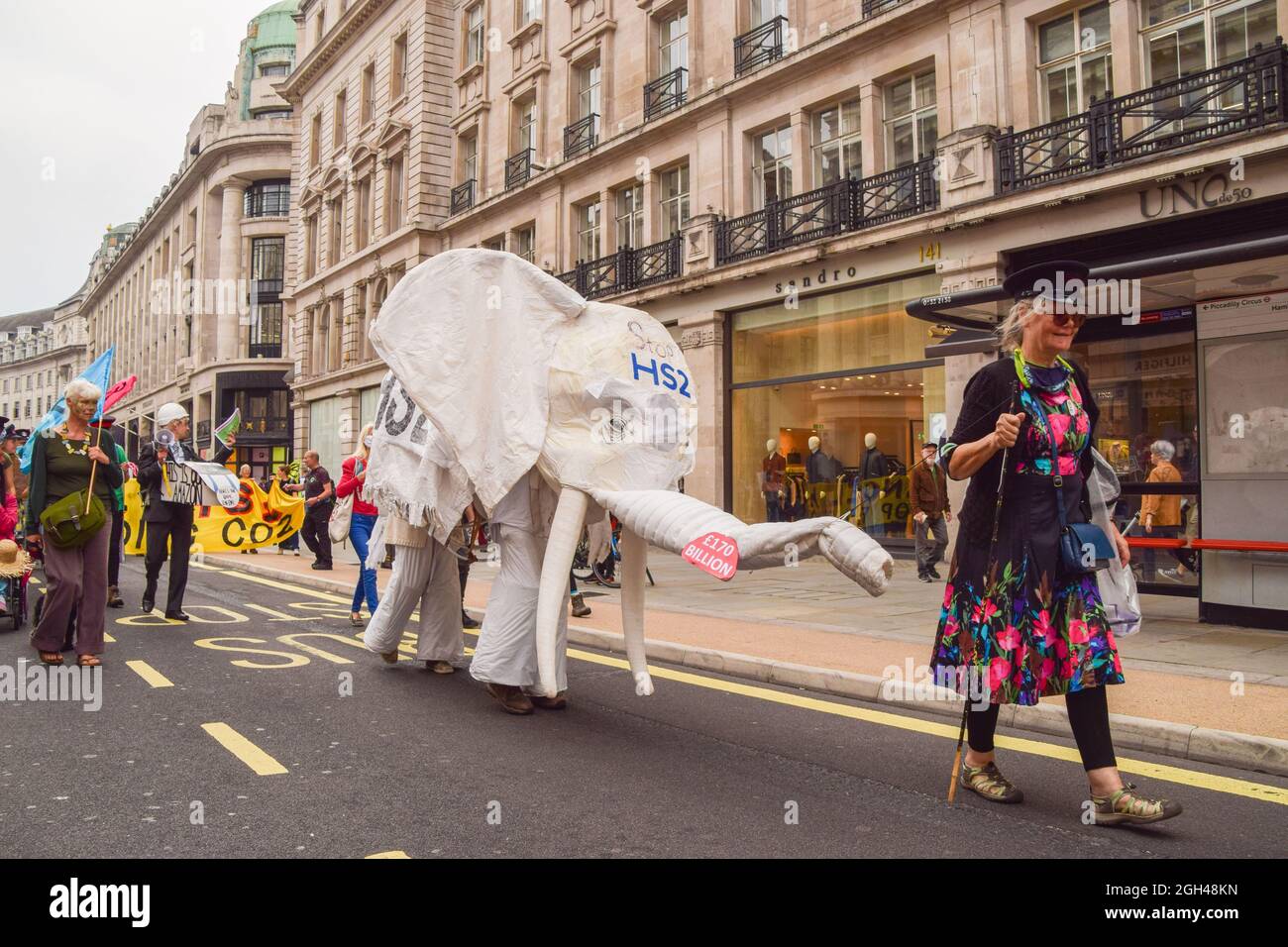 London, UK. 04th Sep, 2021. Protesters wear a white elephant costume in opposition to HS2 (High Speed 2 railway system) during the demonstration in Regent Street.Extinction Rebellion protesters staged the March For Nature on the final day of their two-week Impossible Rebellion campaign, calling on the UK Government to act meaningfully on the climate and ecological crisis. Credit: SOPA Images Limited/Alamy Live News Stock Photo