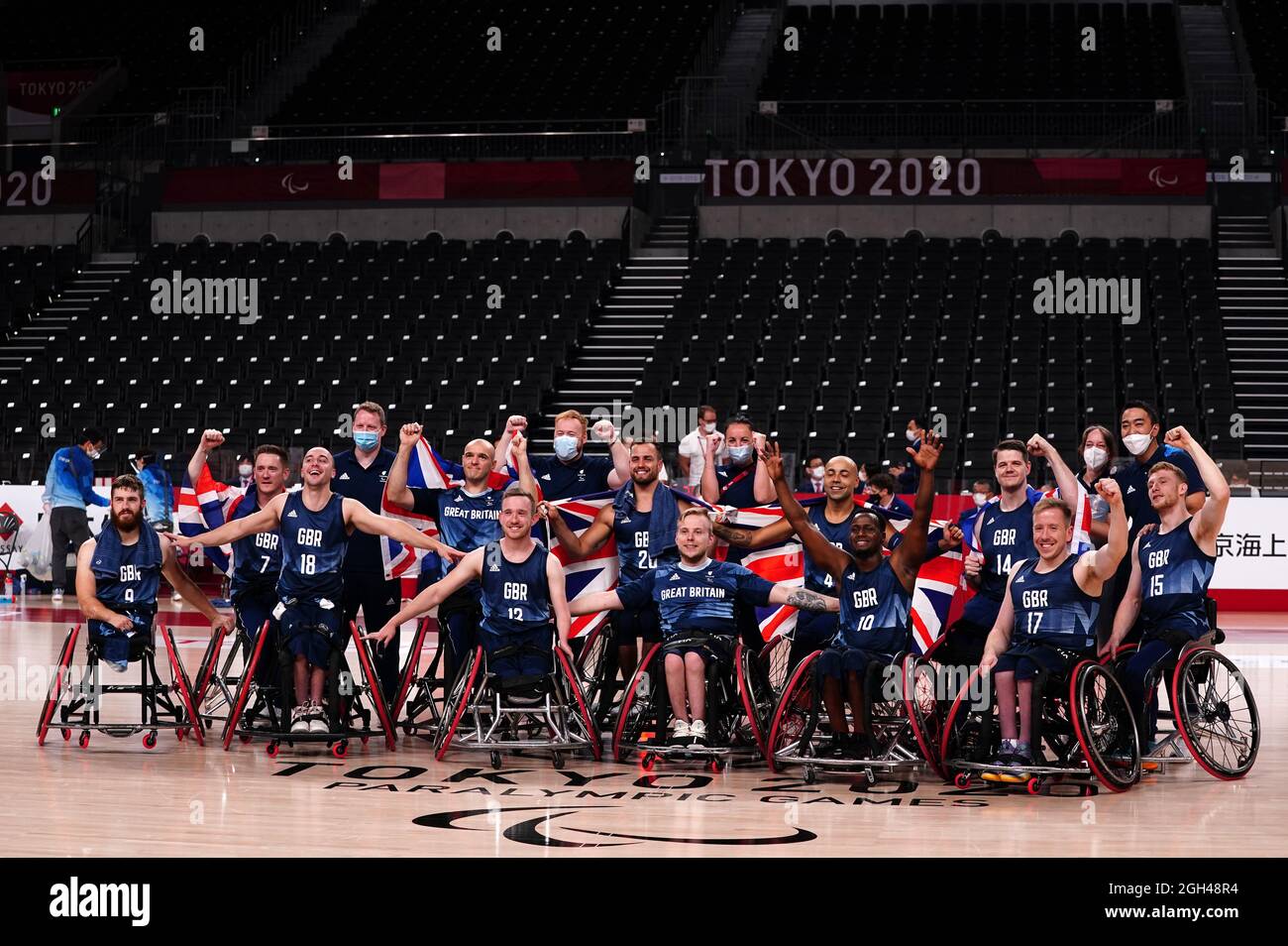 The Great Britain basketball team celebrate bronze medal in the men's basketball at Ariake Arena