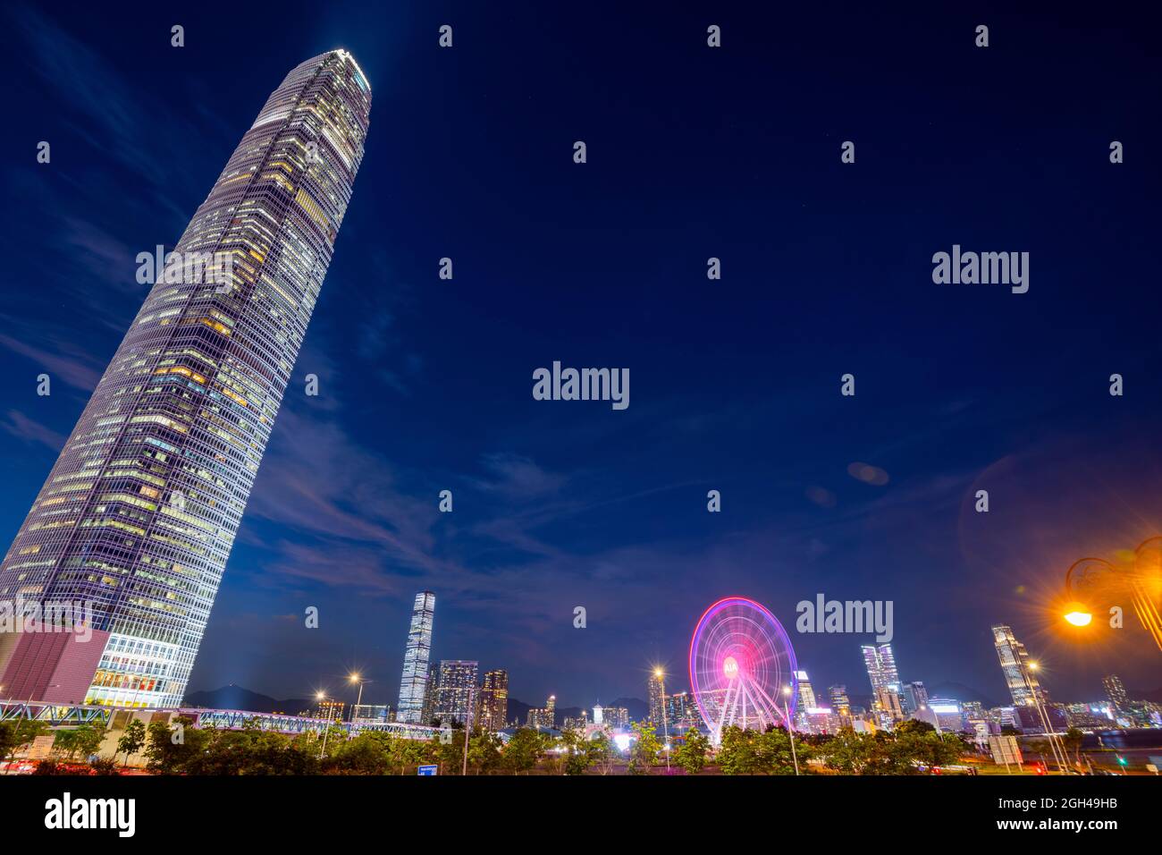 Hong Kong observation wheel and the IFC2 building, Victoria harbor, Hong Kong, China. Stock Photo