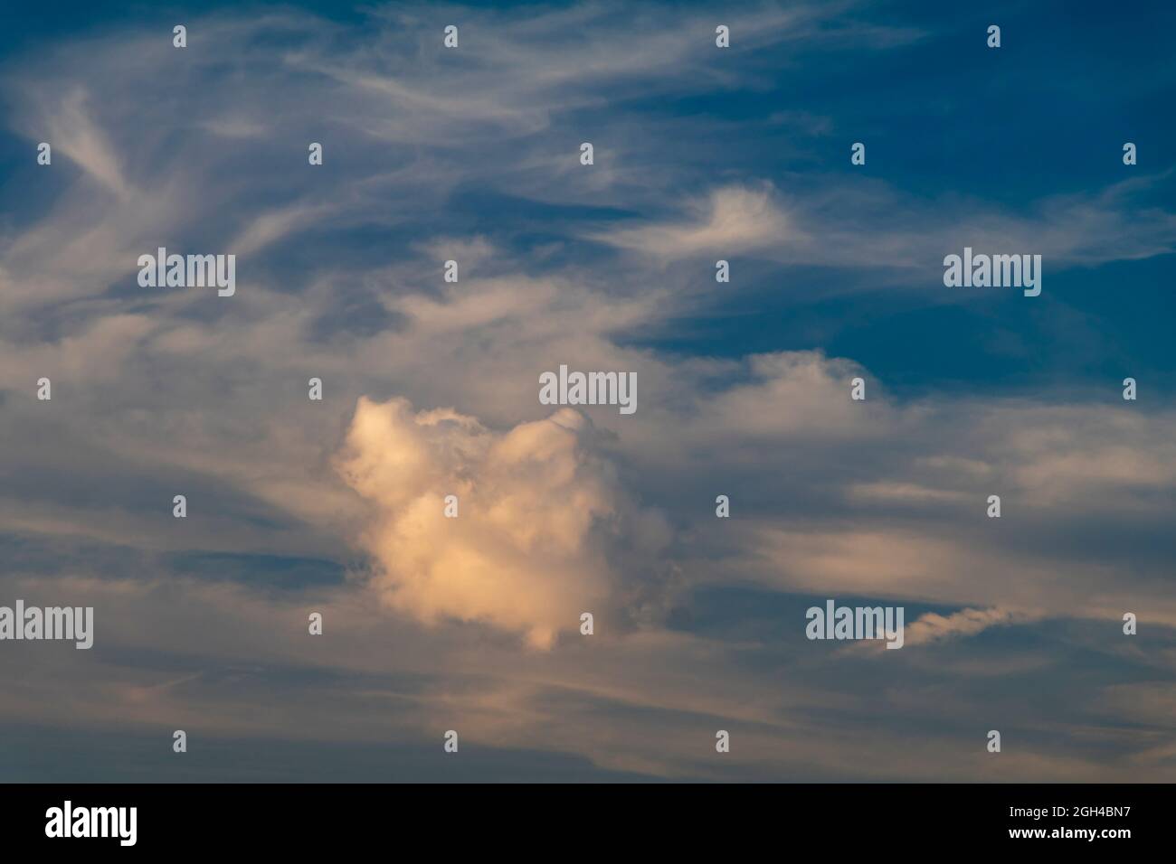 Cloud formation against a blue sky Stock Photo - Alamy