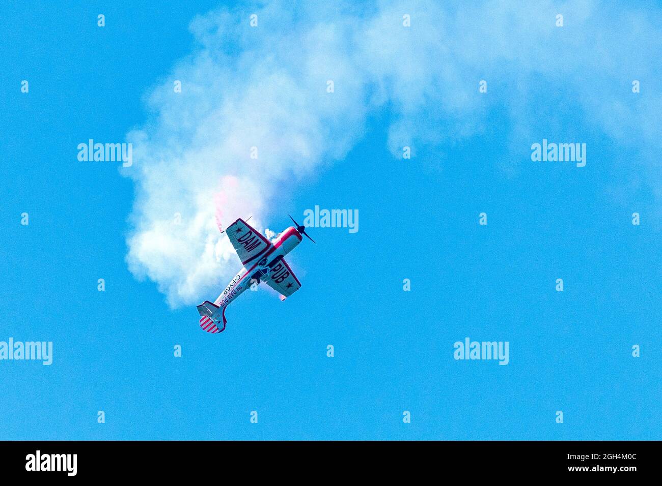 Gord Price Yak-50 or Dam Pub plane flying during the Canadian International Air Show (CIAS) in Toronto, Canada Stock Photo