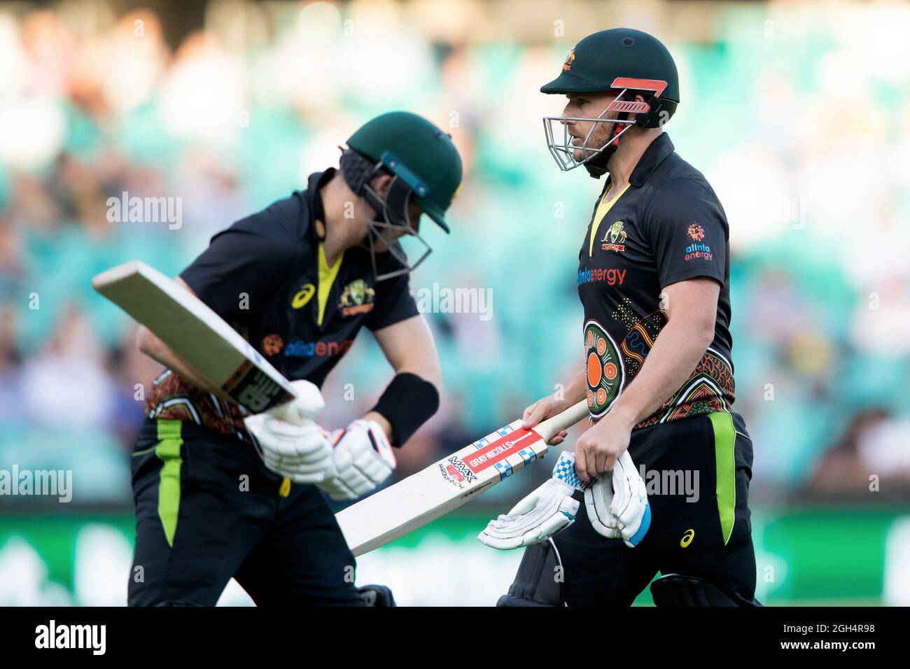 Sydney, Australia, 8 December, 2020. Aaron Finch of Australia is out for a duck as Steven Smith of Australia enters the field during the Dettol T20 Series cricket match between Australia and India at the Sydney Cricket Ground on December 08, 2020 in Sydney, Australia. Credit: Steven Markham/Speed Media/Alamy Live News Stock Photo