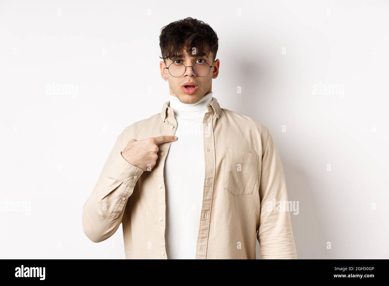 Amazed confused young man hi-res stock photography and images - Alamy