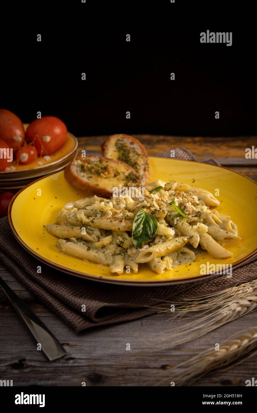 penne pasta with carbonara sauce Stock Photo - Alamy