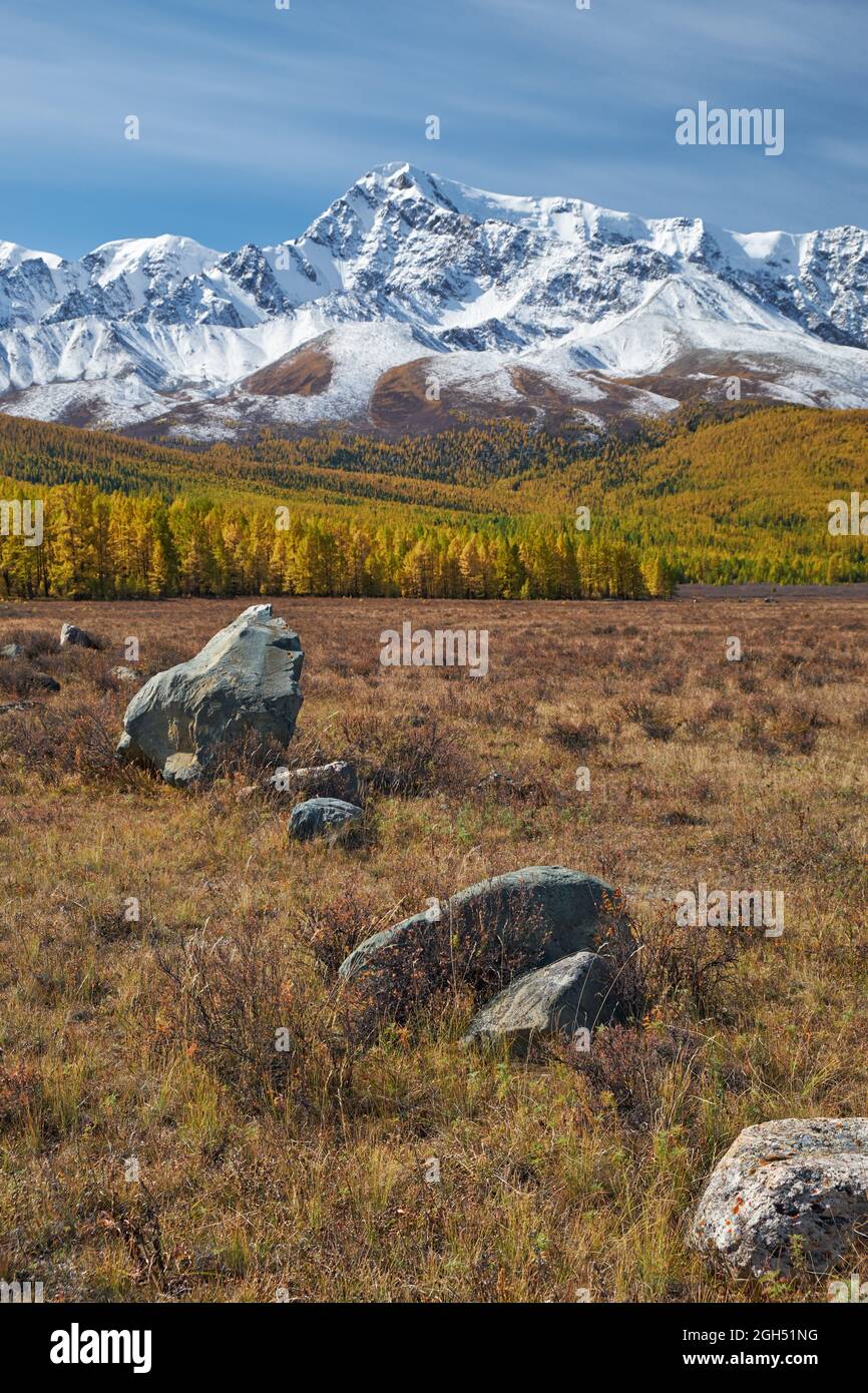 Autumn highland landscape. Picturesque boulders are on foreground and ...