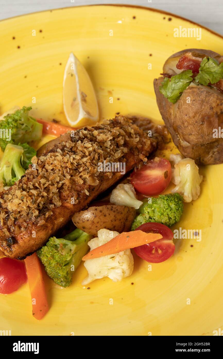 macadamia crusted salmon with vegetable Stock Photo Alamy