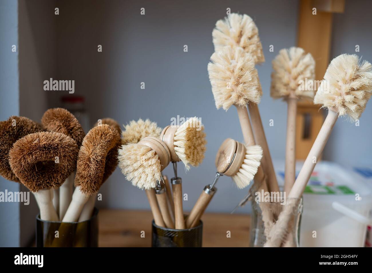 Eco brushes made of coconut. Household products without plastic waste in an eco friendly store Stock Photo