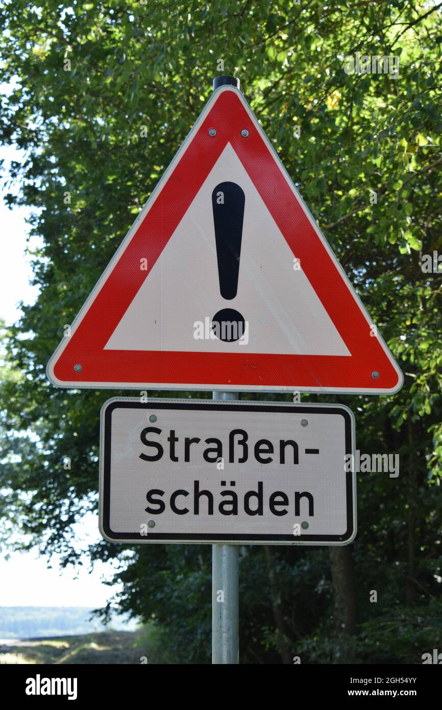 bad road warning sign Stock Photo
