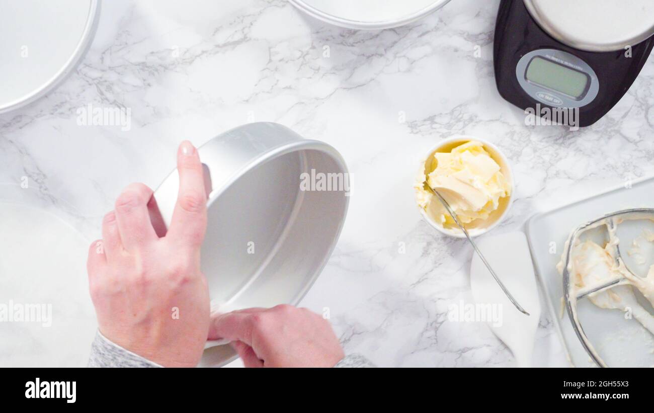 Flat lay. Step by step. Greasing cake pans with butter to bake funfetti