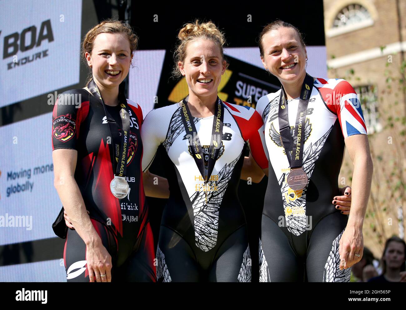 Eagles' Jessica Learmonth (centre) poses with her gold medal after winning the women's race alongside second placed Scorpions' Georgia Taylor-Brown (left) and third placed Eagles' Vicky Holland during the Super League Triathlon Championship 2021 in London. Picture date: Sunday September 5, 2021. Stock Photo