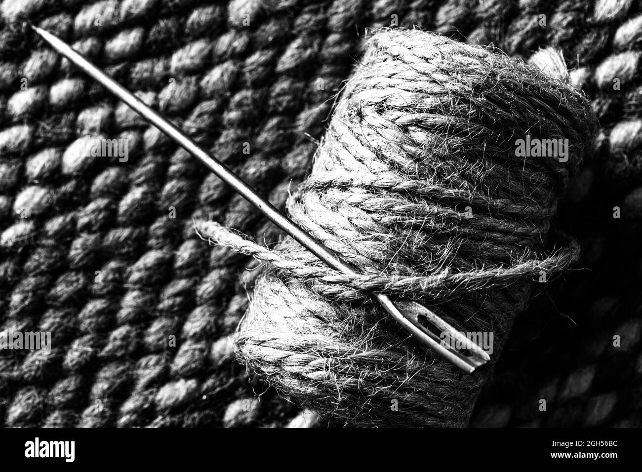 Black Thread And Needle In White Cloth Stock Photo 42447753 - Megapixl