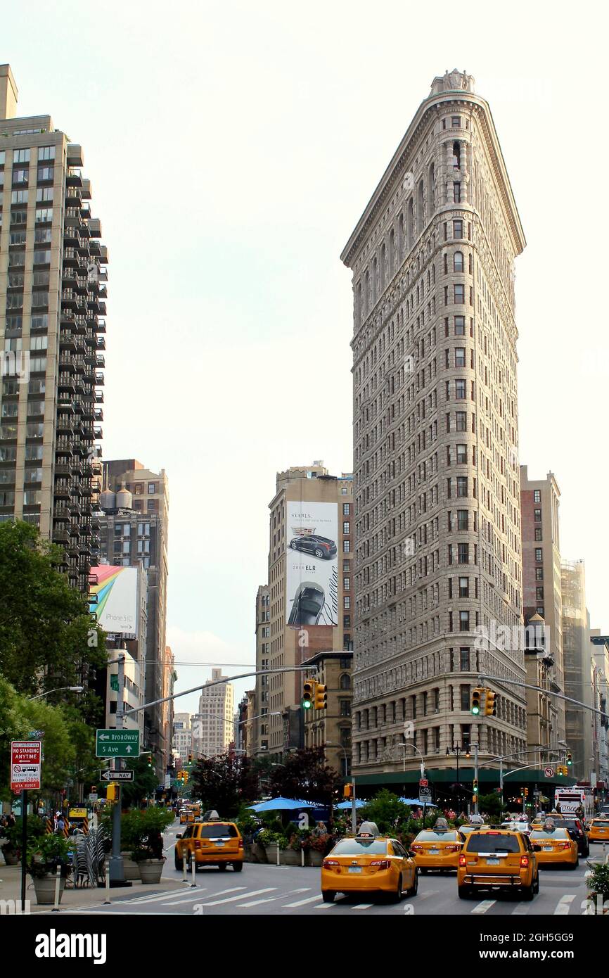 The Flatiron Building is a triangular 22-story steel-framed landmarked building located at 175 Fifth Avenue in the borough of Manhattan, USA, New York Stock Photo
