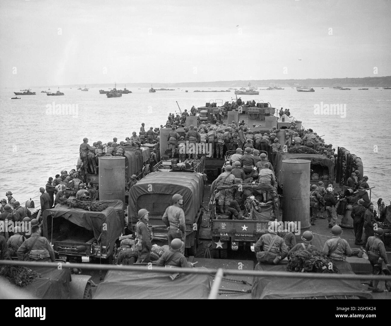 Soldiers and vehicles crammed on the deck of a Roal Navy ship at the Normandy Landings (D-Day) on the 6th June 1944 Stock Photo