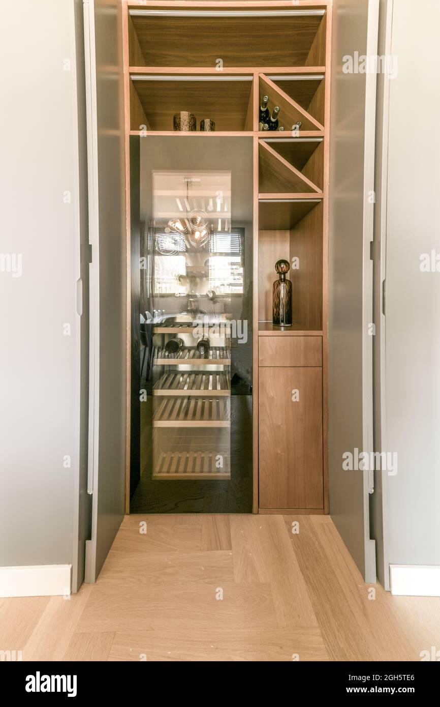 Small round bathtub with water tap located in stylish hotel room