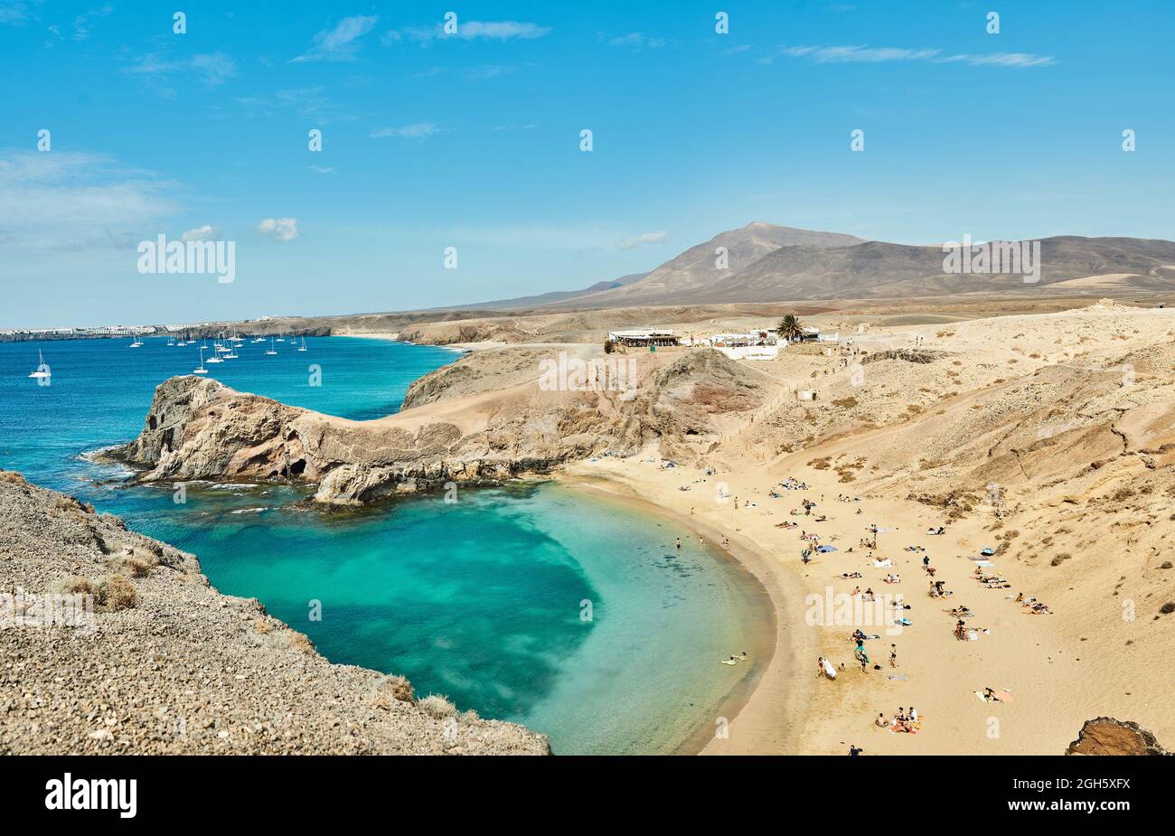 Drone View Of Sandy Beach With Tourists Located Near Calm Sea With Drone View Of Sandy Beach With Tourists Located Near Calm Sea With
