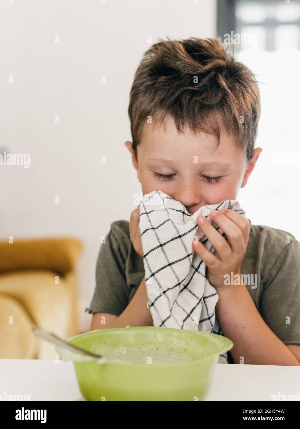 Boy wiping mouth with napkin hires stock photography and images Alamy