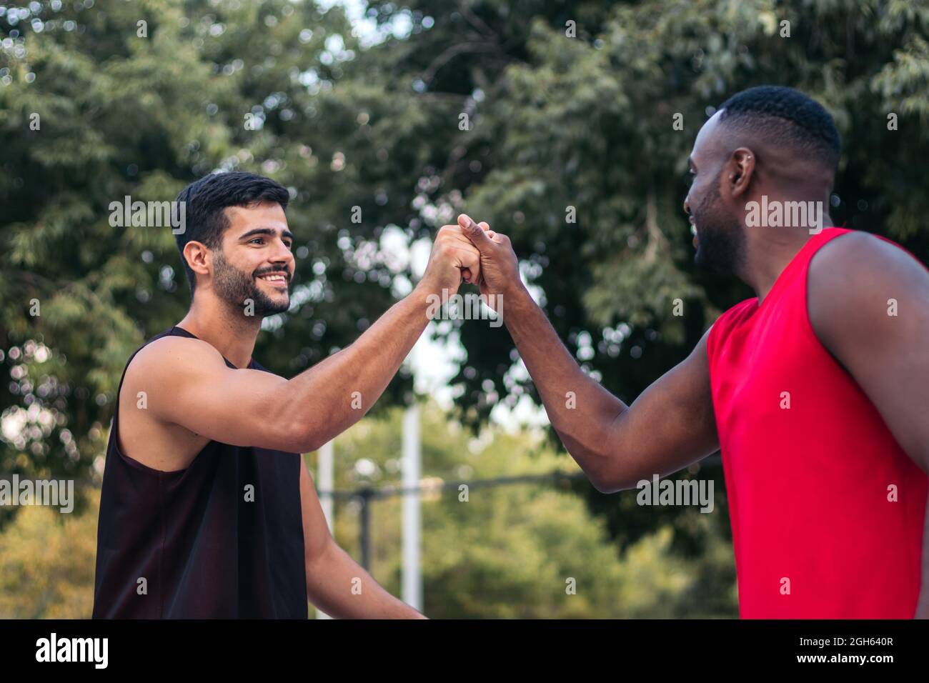 Handshake looking at each other hires stock photography and images Alamy
