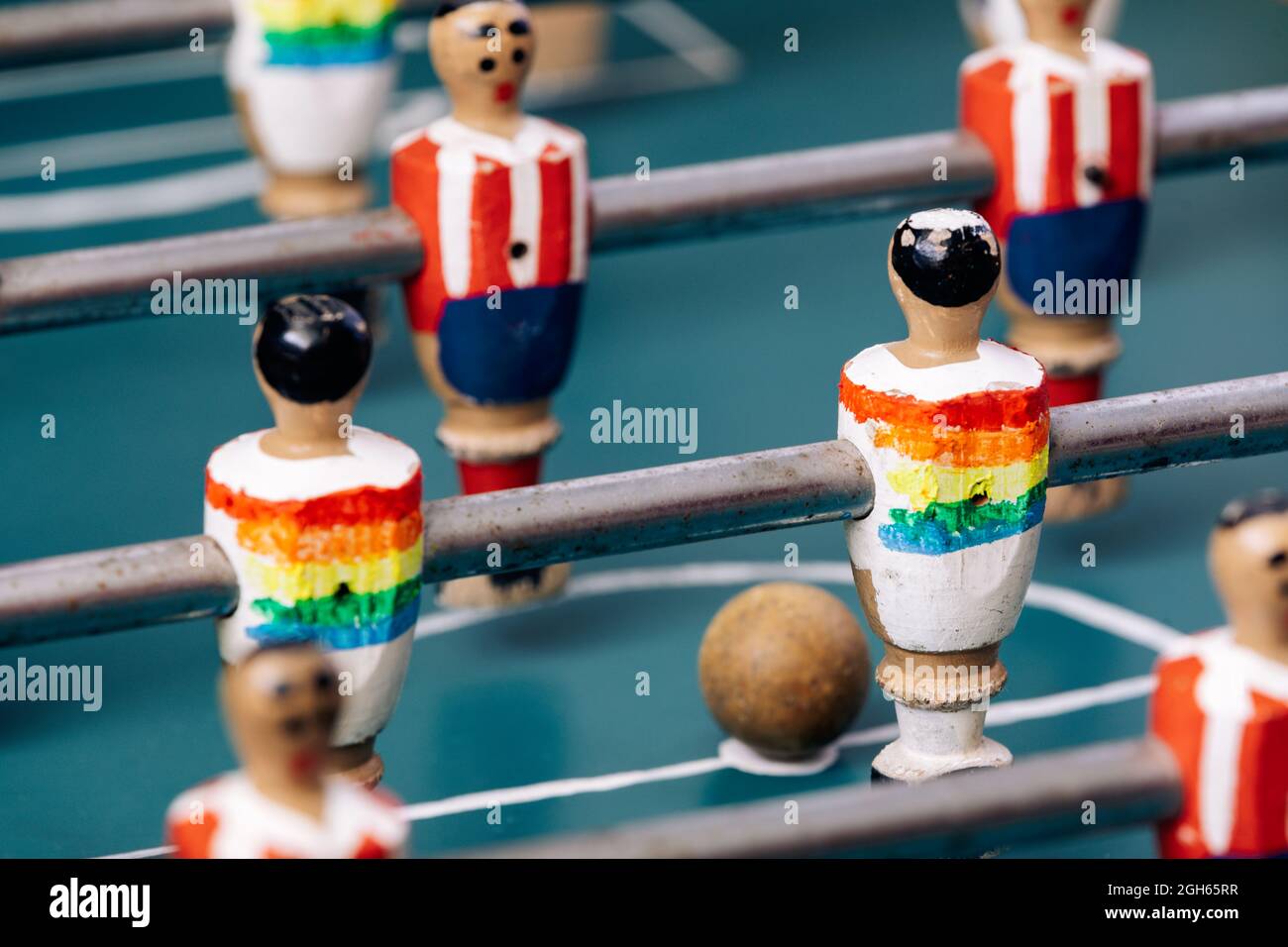High angle of detail of retro table soccer with wooden miniature