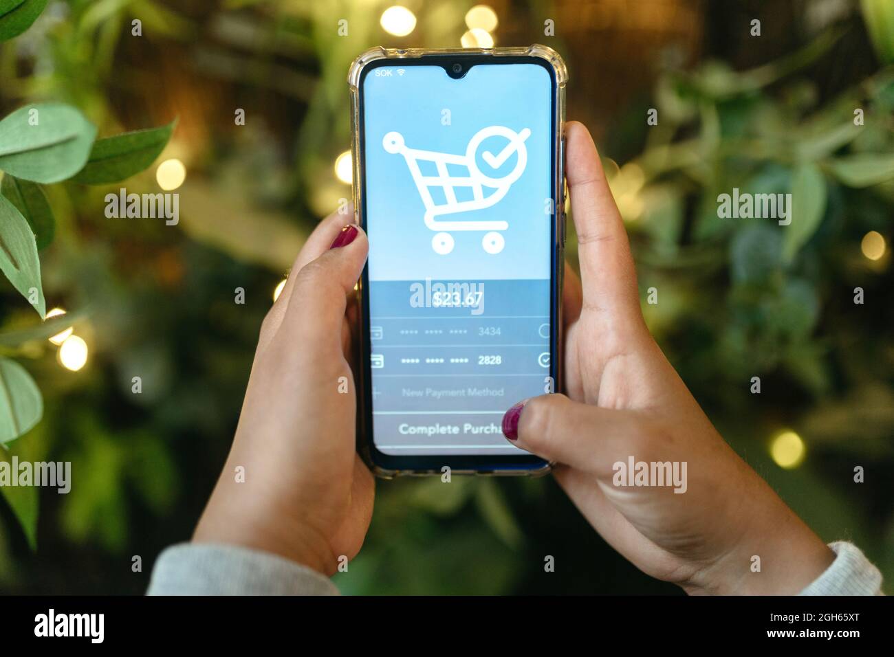 Crop Anonymous Female Using Application For Online Shopping On Mobile Phone And Making Payment For Order Stock Photo Alamy