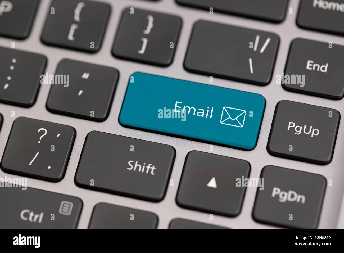 Button with the word email on a keyboard. Communication on internet globally concept. Stock Photo