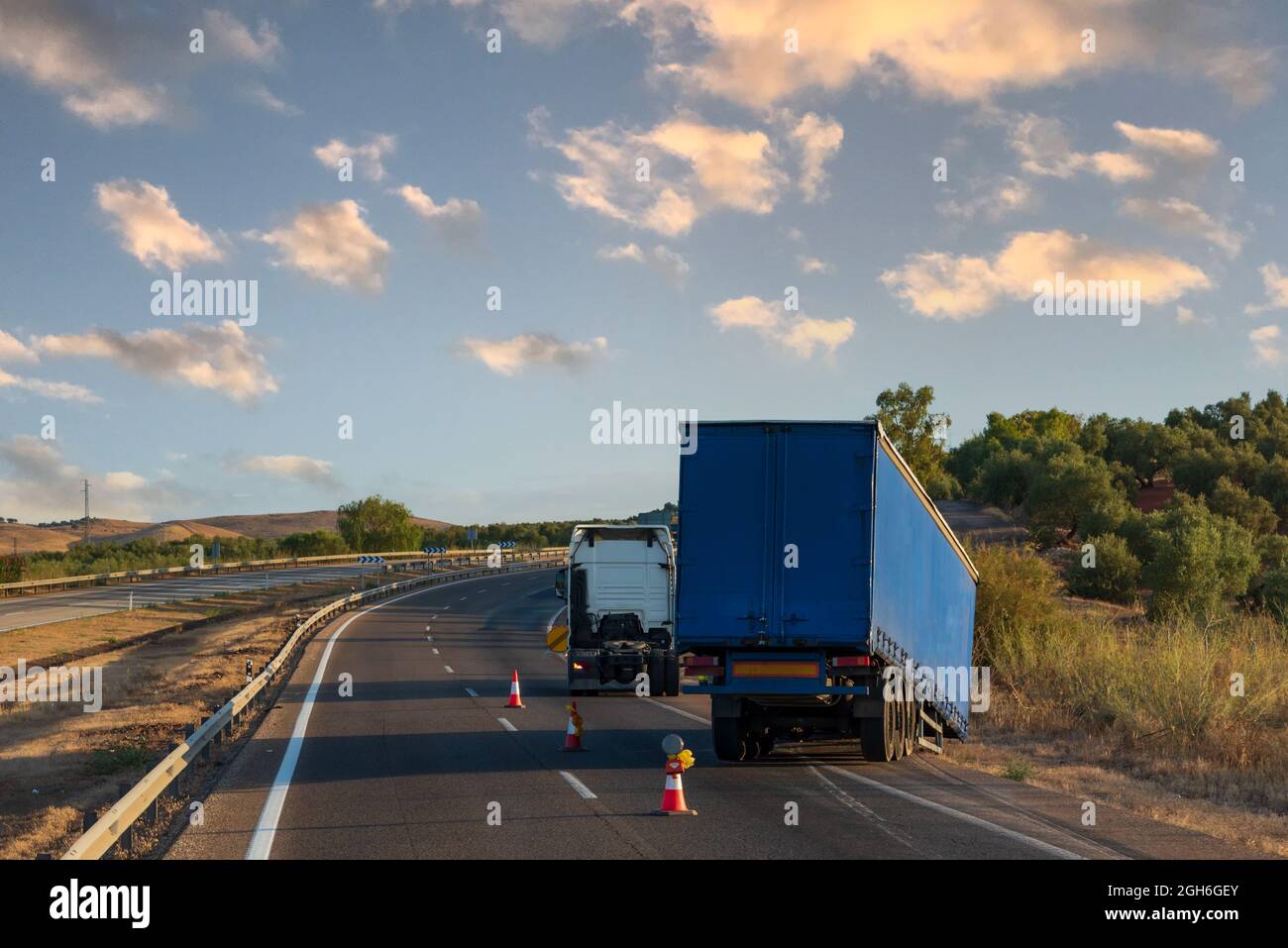 Semi-trailer uncoupled from the truck while driving, causing an accident. Stock Photo