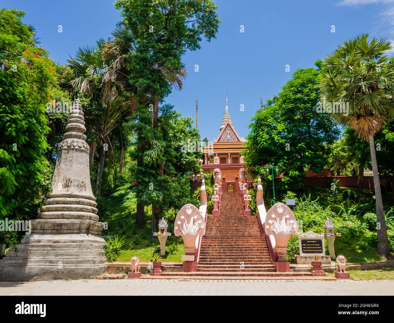 Stunning view of the main stairway with multi-headed snakes, leading to the Wat Phnom Pagoda, Phnom Penh, Cambodia Stock Photo