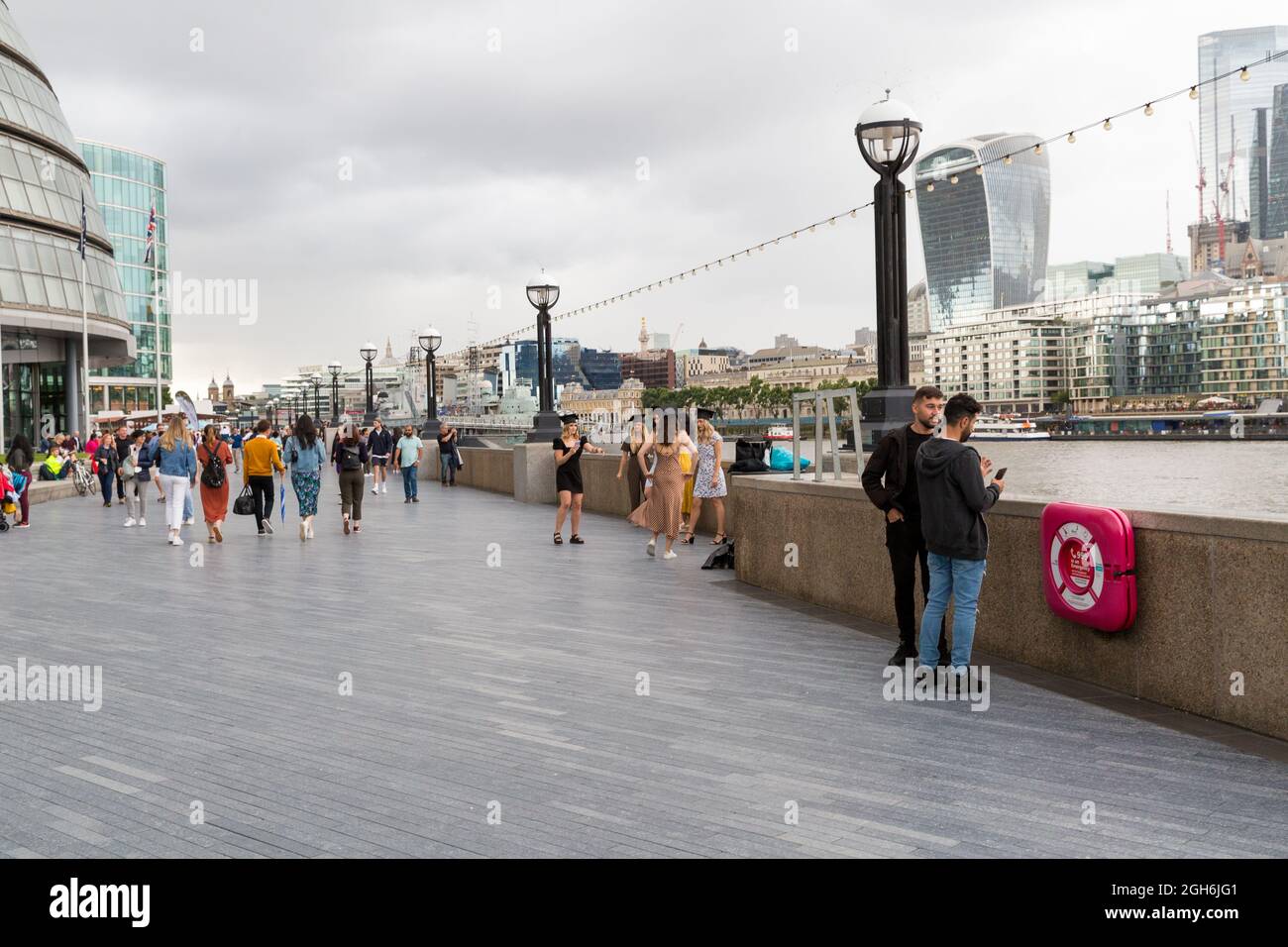 Graduation selfie photos on Queen's Walk London Stock Photo