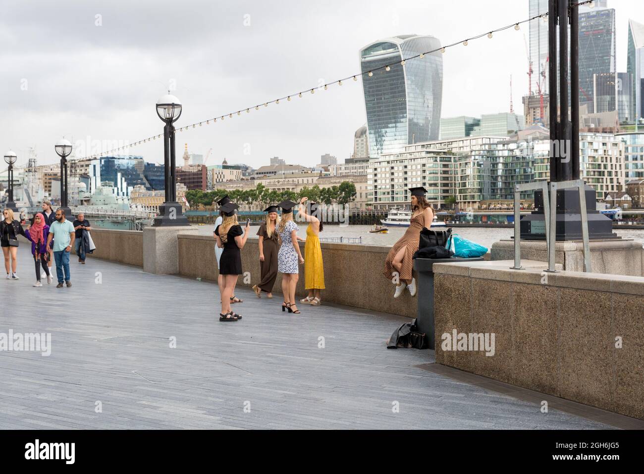 Graduation selfie photos on Queen's Walk London Stock Photo