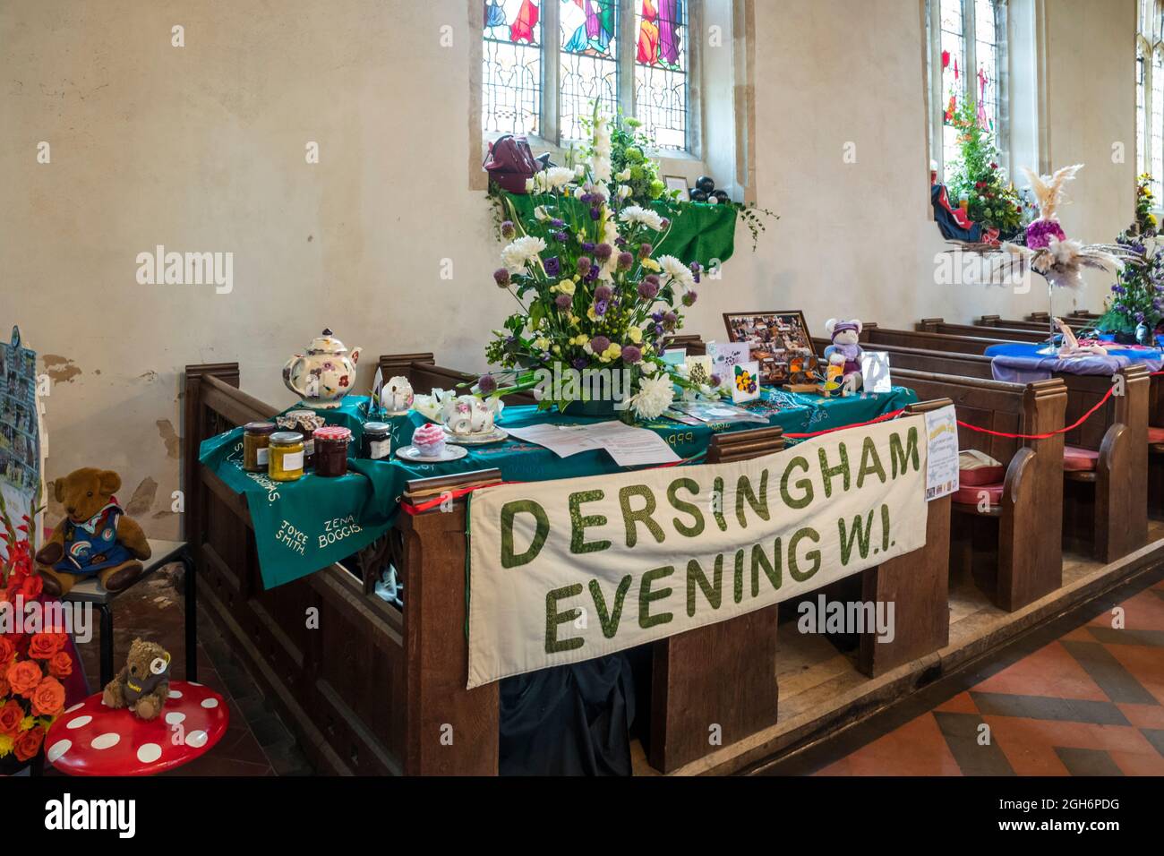 Display by Dersingham Women's Institute in St Nicholas' church, as part of the Dersingham Open Gardens day. Stock Photo