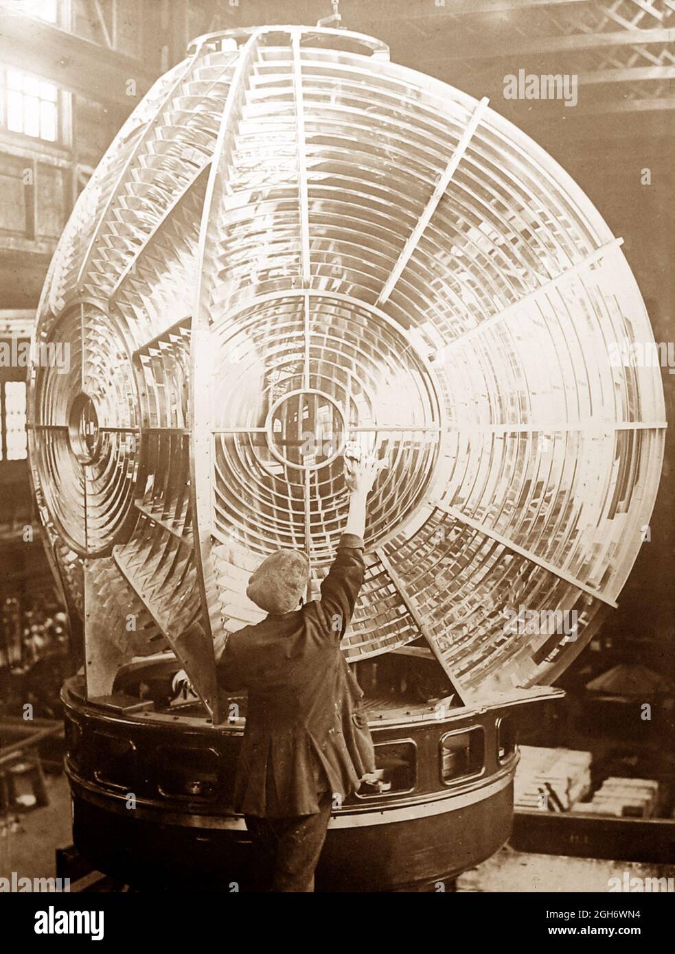 Lighthouse keeper cleaning the lens, Victorian period Stock Photo Alamy