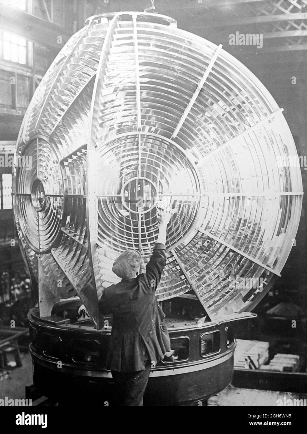 Lighthouse keeper cleaning the lens, Victorian period Stock Photo Alamy