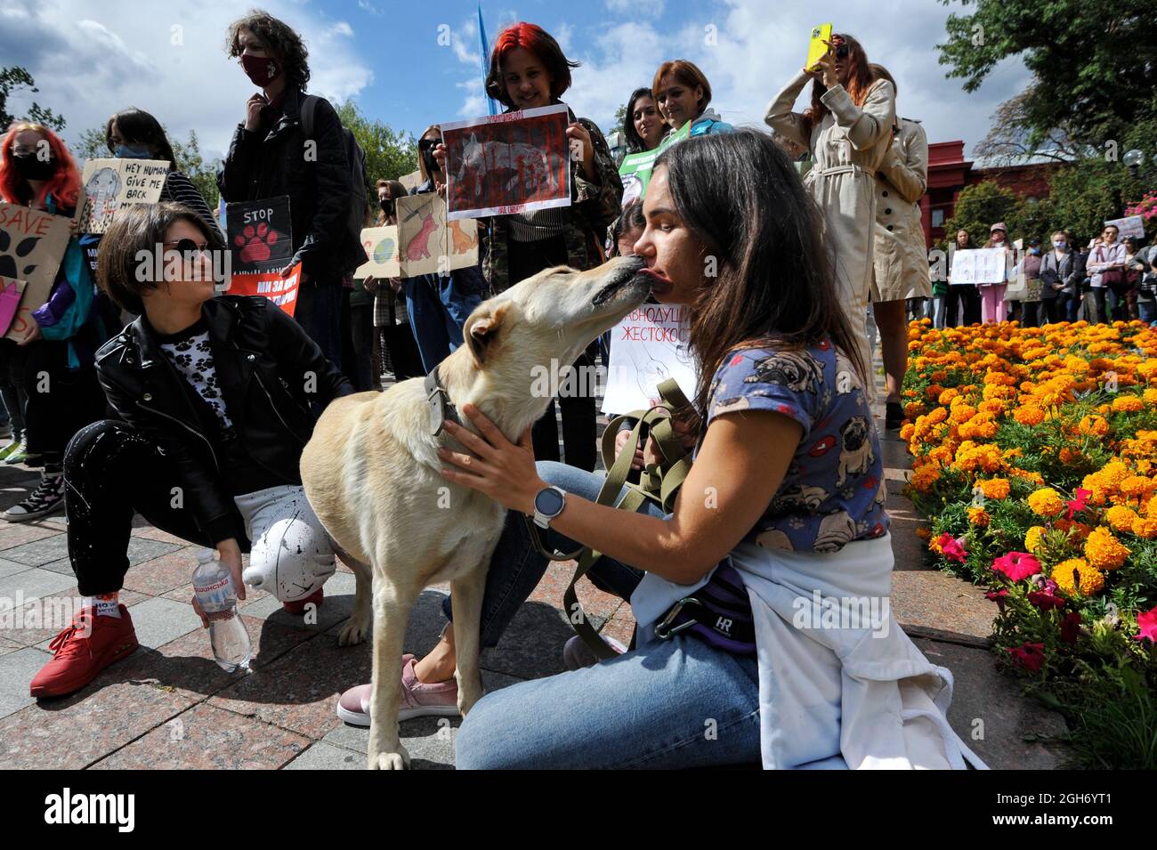 Kyiv, Ukraine. 05th Sep, 2021. An animal protection activist kisses her dog  during a rally in  march for animal rights was held in Kiev, under  the slogan 