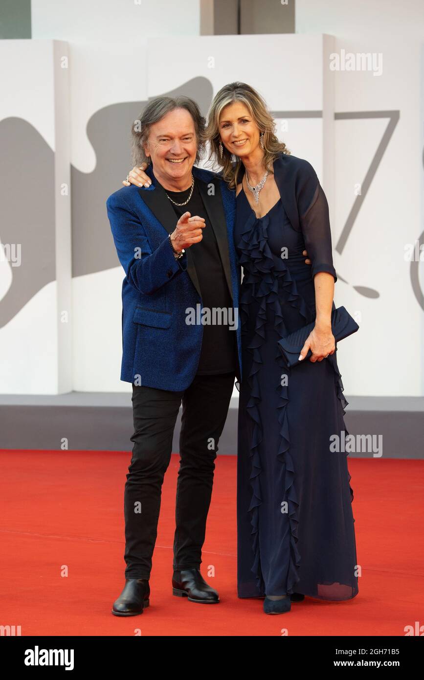 Bruno "Red" Canzian and his wife Beatrix Niederwieser attends the red  carpet of the movie "Competencia Oficial" during the 78th Venice  International F Stock Photo - Alamy