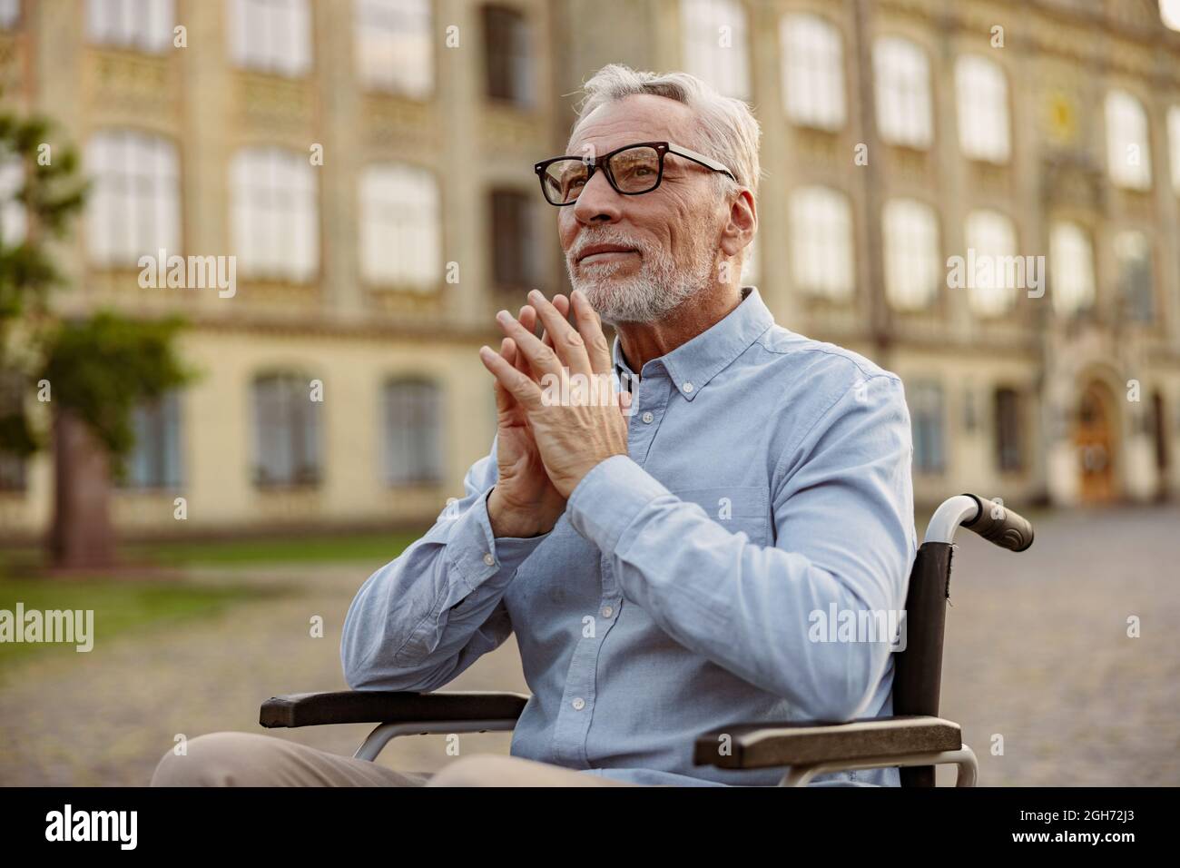 Old man wheelchair thinking hi-res stock photography and images - Alamy