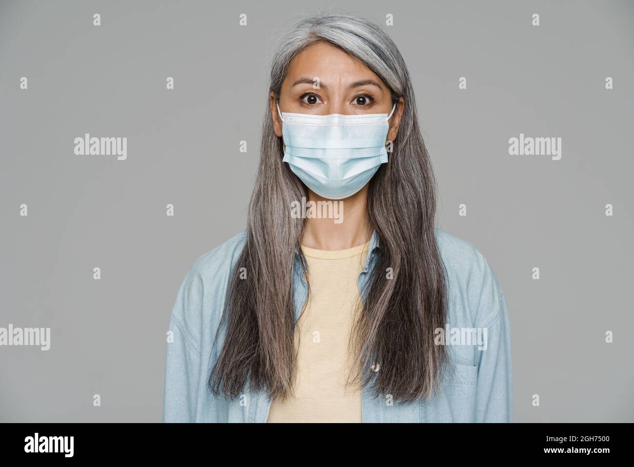 Mature woman face looking to camera hi-res stock photography and images ...
