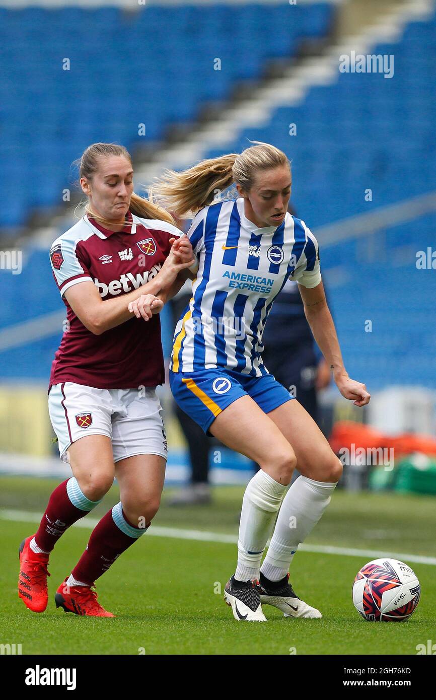 Brighton And Hove, UK. 05th Sep, 2021. Claudia Walker of West Ham United Women tussles with Megan Connolly of Brighton & Hove Albion Women during the FA Women's Super League 1 match between Brighton & Hove Albion Women and West Ham United Women at the American Express Community Stadium, Brighton and Hove, England on 5 September 2021. Photo by Carlton Myrie. Editorial use only, license required for commercial use. No use in betting, games or a single club/league/player publications. Credit: UK Sports Pics Ltd/Alamy Live News Stock Photo
