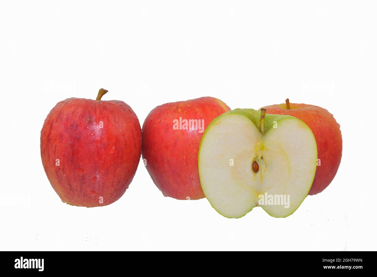 Fresh ripe red and green apples isolated on white. Red apples isolated on white background, clipping path, full depth of field. Stock Photo