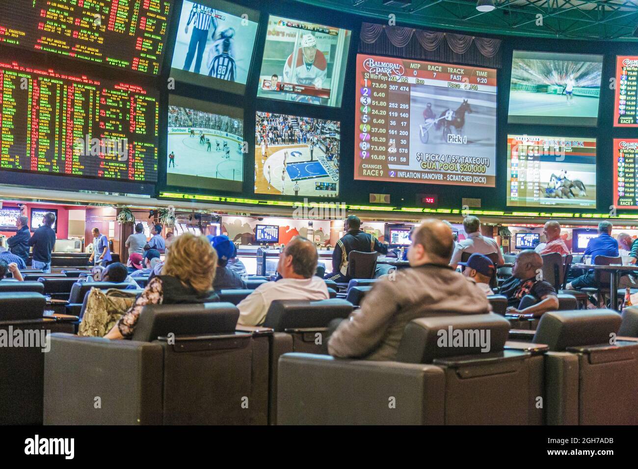 Las Vegas Nevada,Westgate Las Vegas Resort & Casino,sportsbook,betting odds gamblers gambling sporting events monitors men Stock Photo
